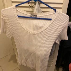 V-neck ribbed sweater. Comfortable can be worn casual or for dress